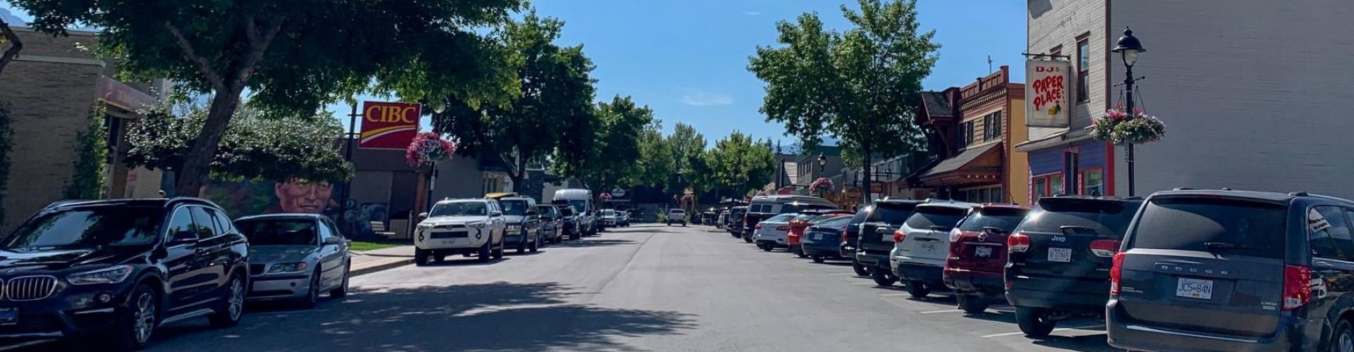 Downtown street with parked cars