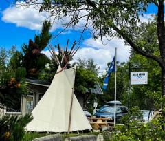 A teepee set up in front of the Metis National Columbia River Society Office